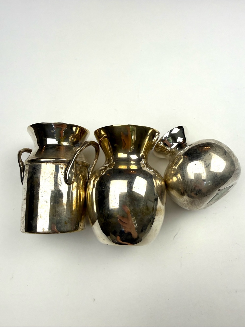 Two’s Company silver bud vases and candle holder